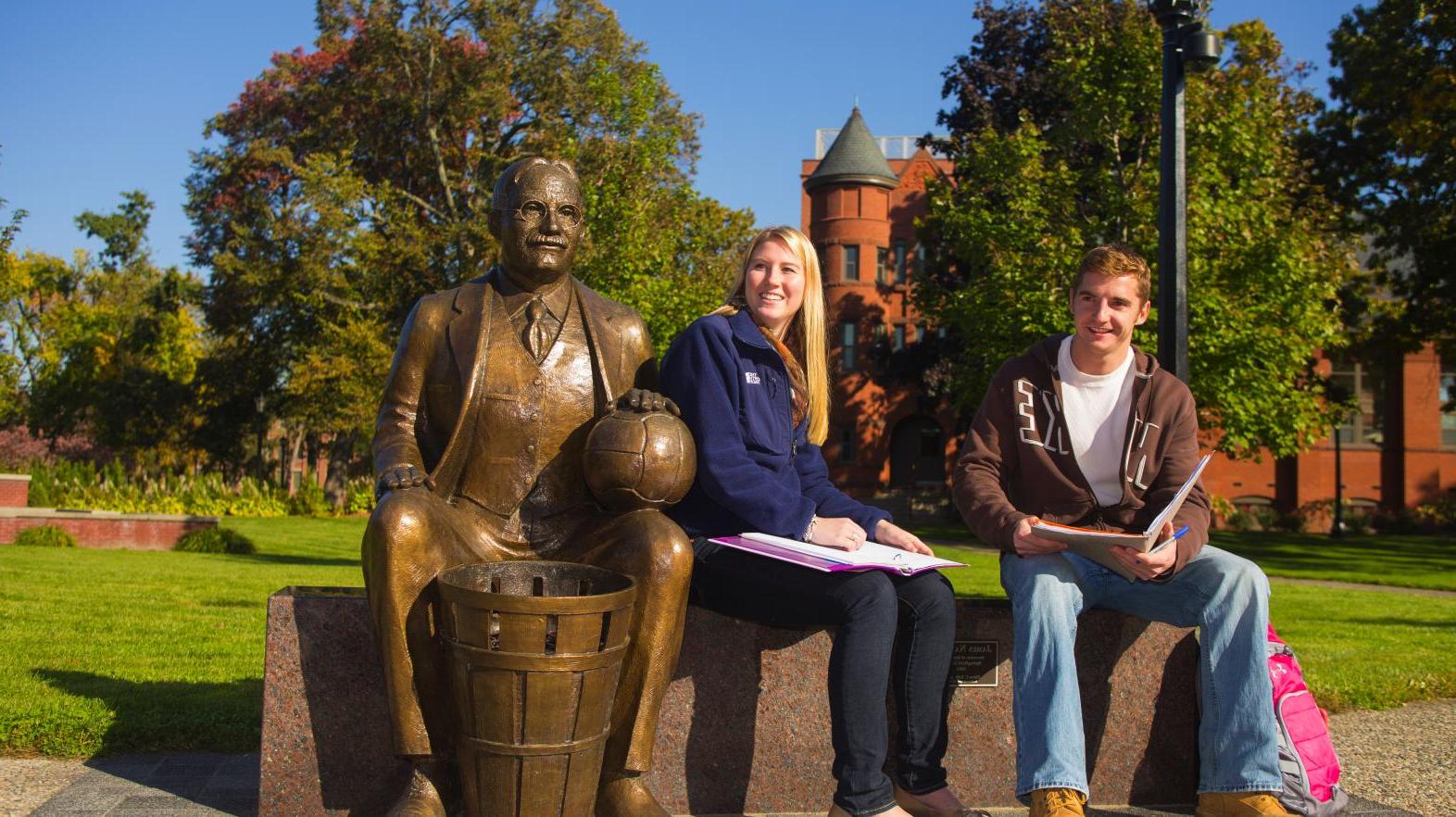 A larger-than-life bronze statue of James Naismith is unveiled on Naismith Green.